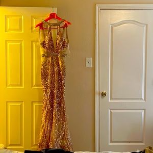 A gold shimmer ankle length Beautiful formal dress.